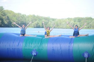 girls on the blob at camp